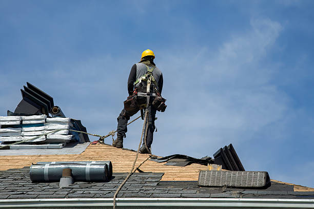 Professional Roof Replacement technician working in Welches, OR